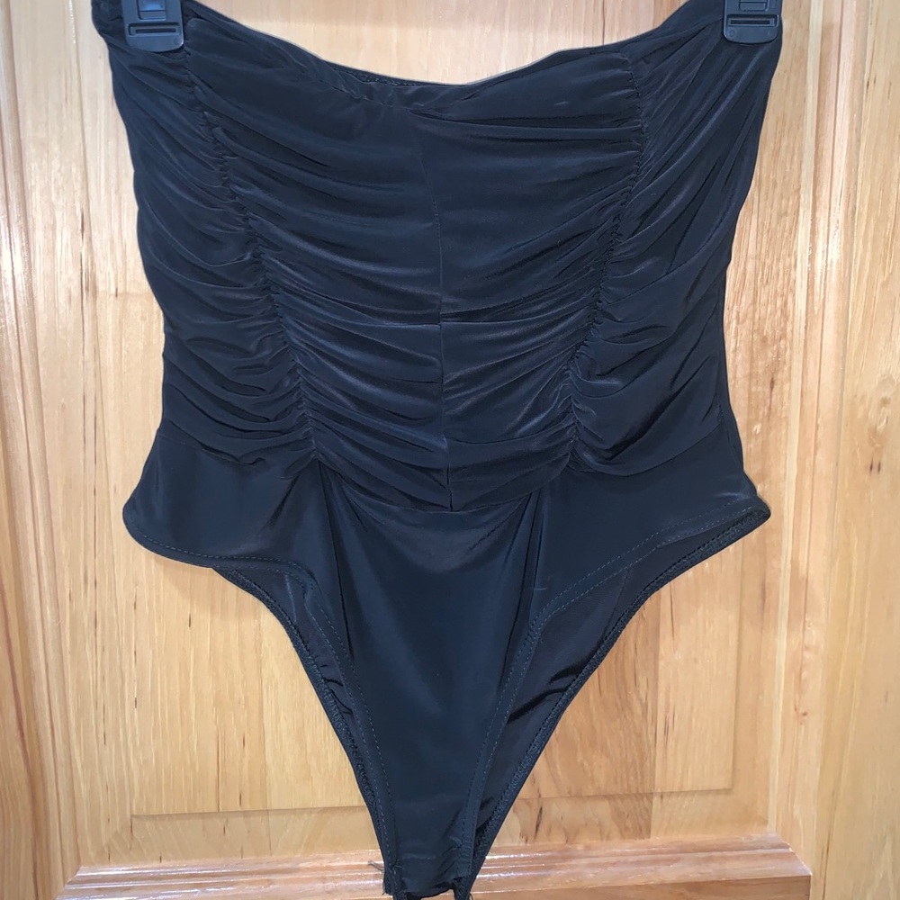 Nastygal bodysuit/never worn